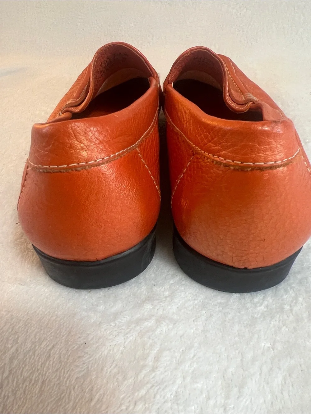 Rockport women’s orange pebbled leather square toe penny loafers